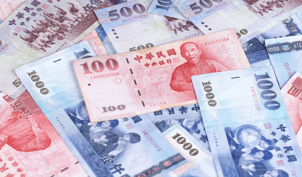 Taiwan dollar jumps 2% as exporters pressure central bank